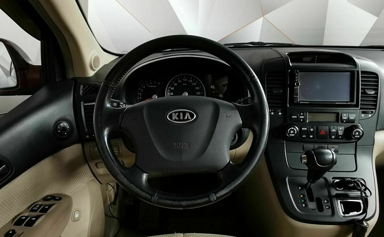 Kia Carnival 2.7 AT (186 л.с.) Красный
