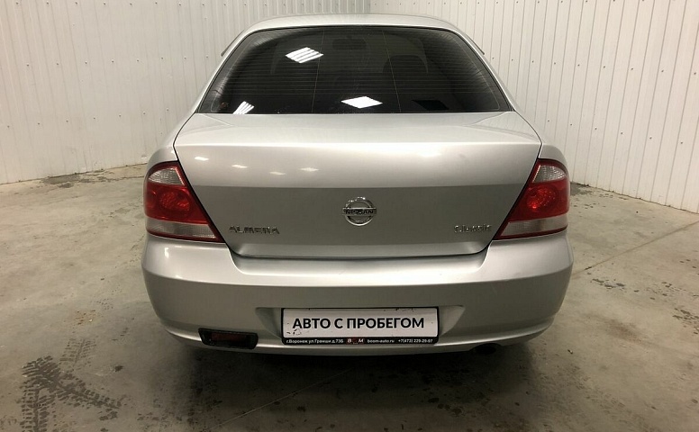 Nissan ALMERA_CLASSIC 1.6 MT (107 л.с.)