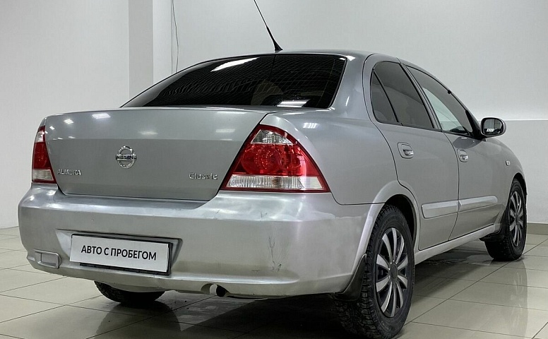 Nissan ALMERA_CLASSIC 1.6 MT (107 л.с.)